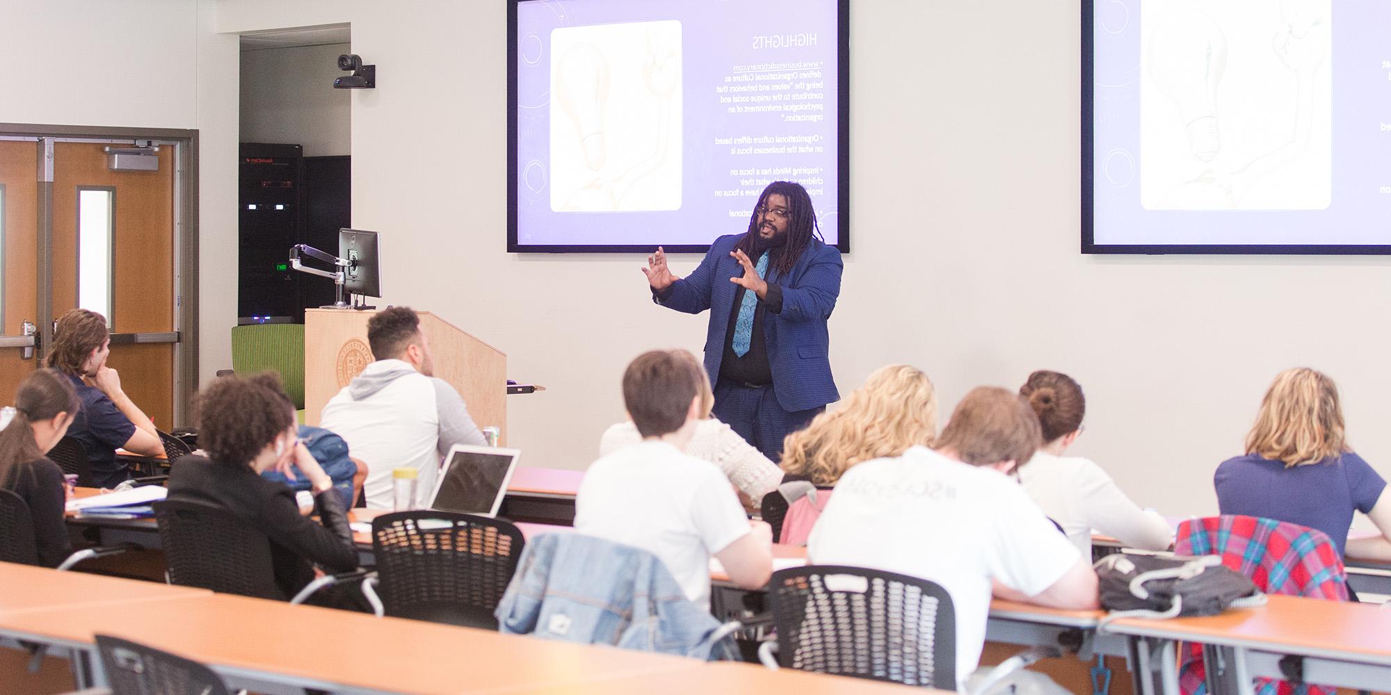 Male Professor Lecturing History Class